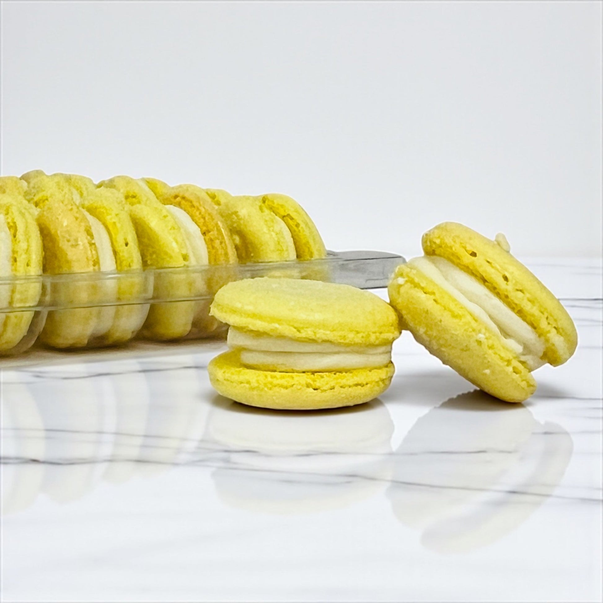 50 Pack Lemon Curd French Macarons - Macaron Centrale