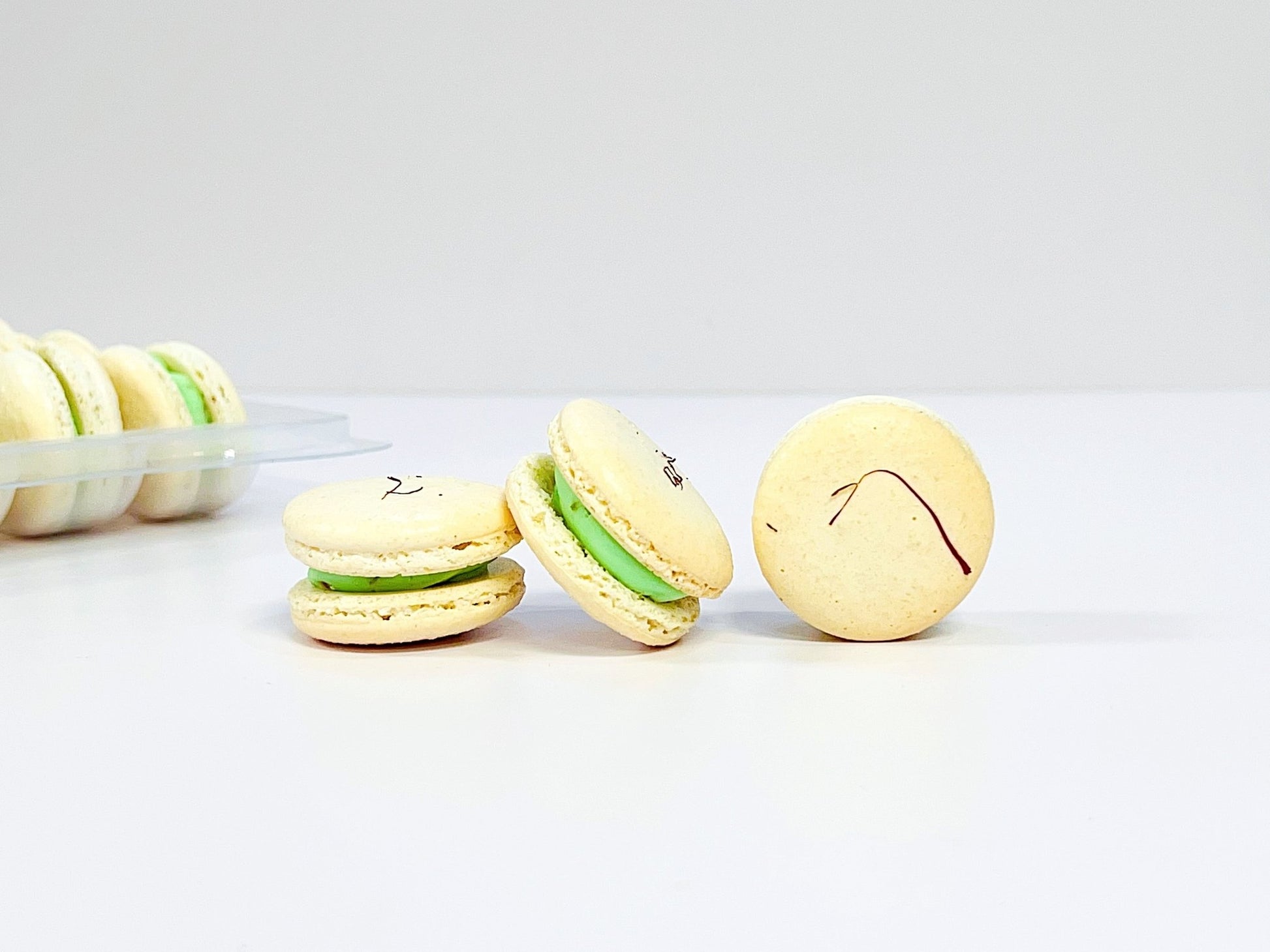 50 Pack Saffron Pistachio French Macaron Value Pack - Macaron Centrale